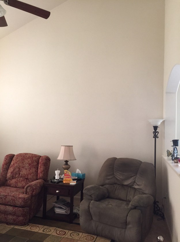 I've got several big, empty walls like this one in the living room that need attention.